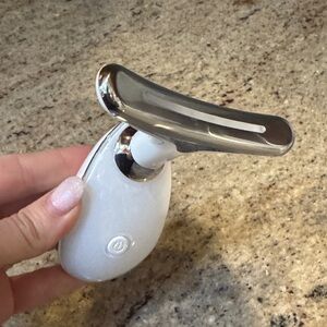 White and Silver Facial Massager
